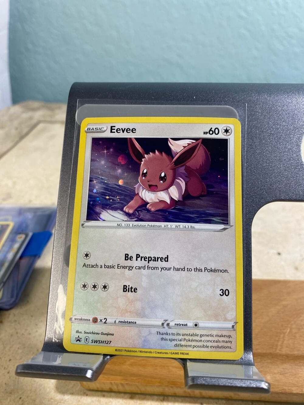 Pokémon Eevee SWSH127 Black Star Promo Cosmos Holo Card